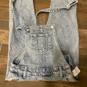 Distressed style overall jeans